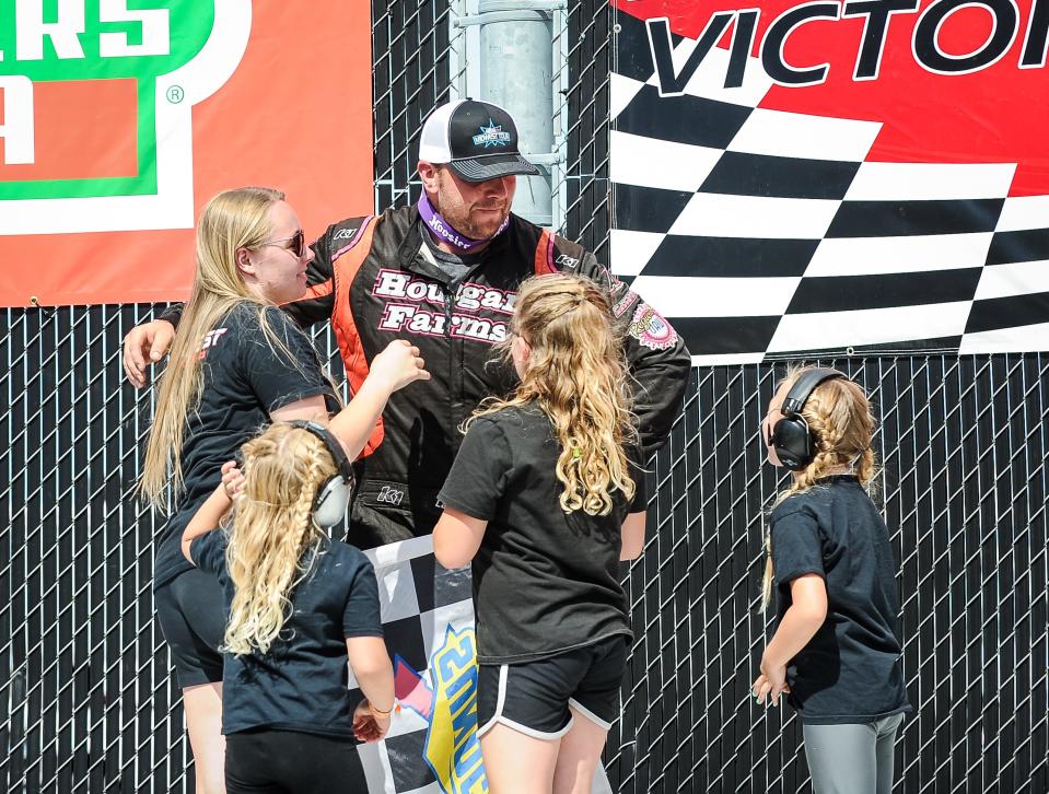 Casey Johnson's family joins him in victory lane last year after he won the Midwest Tour Father's Day 100 at the Milwaukee Mile. The race will be one of three big Wisconsin racing events on the July 16-18 weekend.