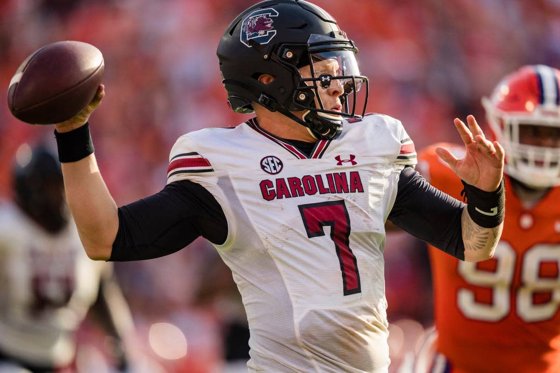 South Carolina quarterback Spencer Rattler (7) drops back to pass in the second half of an NCAA college football game against Clemson on Saturday, Nov. 26, 2022, in Clemson, S.C.