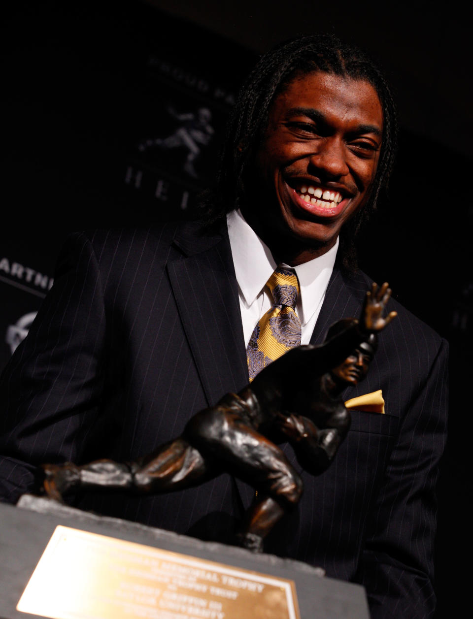 NEW YORK, NY - DECEMBER 10: Robert Griffin III of the Baylor Bears poses with the trophy after being named the 77th Heisman Memorial Trophy Award winner during a press conference at The New York Marriott Marquis on December 10, 2011 in New York City. (Photo by Jeff Zelevansky/Getty Images)