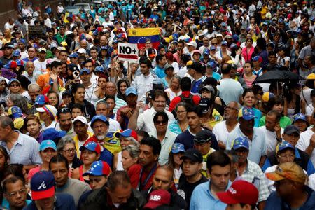 Demonstrators rally against Venezuela's President Nicolas Maduro in Caracas, Venezuela, April 13, 2017. REUTERS/Carlos Garcia Rawlins