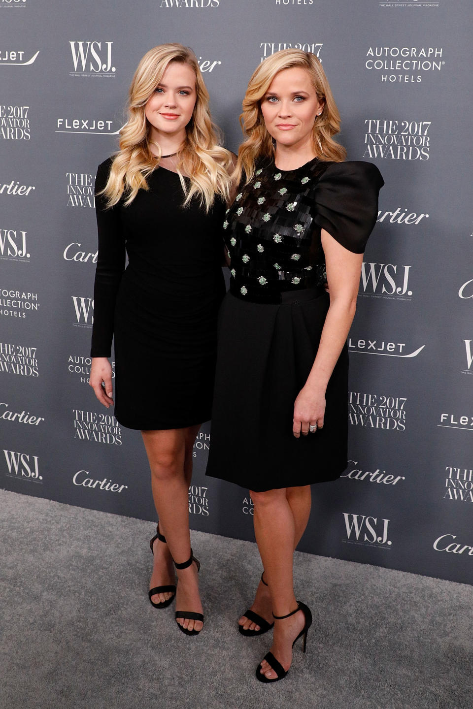 <p>These two looked more like sister-sister than mother-daughter while attending <em>WSJ Magazine</em>’s 2017 Innovator Awards in New York City. Ava and Reese both wore black dresses — Balmain and Giorgio Armani, respectively — and struck similar poses on the red carpet. Reese’s 18-year-old mini-me even has her closed-mouth smile down pat. (Photo: Getty Images) </p>
