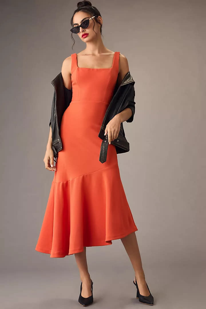 The Ariana Square-Neck Asymmetrical Ruffle-Hem Dress. Image via Anthropologie.