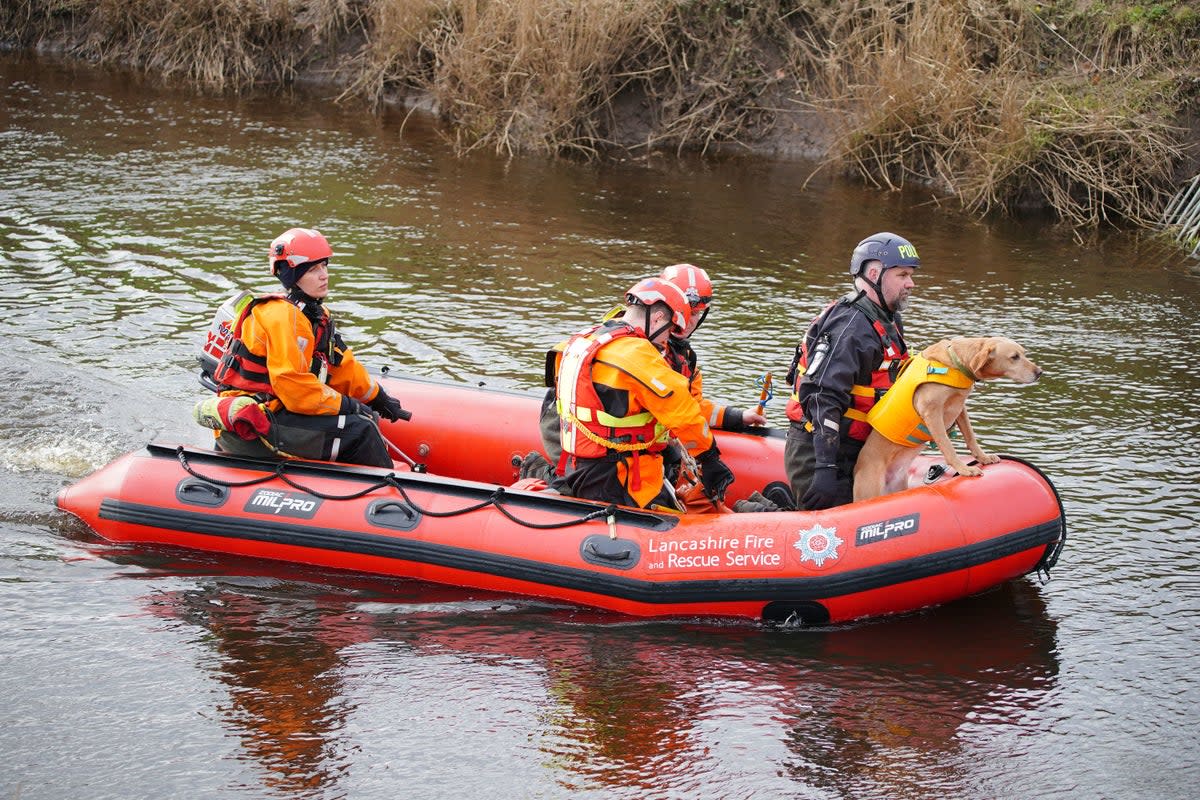 Specialist search teams from Lancashire Fire and Rescue Service and the police, on the River Wyre, in St Michael's on Wyre, Lancashire (Peter Byrne/PA Wire)