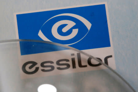 FILE PHOTO: Lens producers Essilor' s logo is seen in an optician shop in Paris, France, March 15, 2016. REUTERS/Philippe Wojazer/File Photo