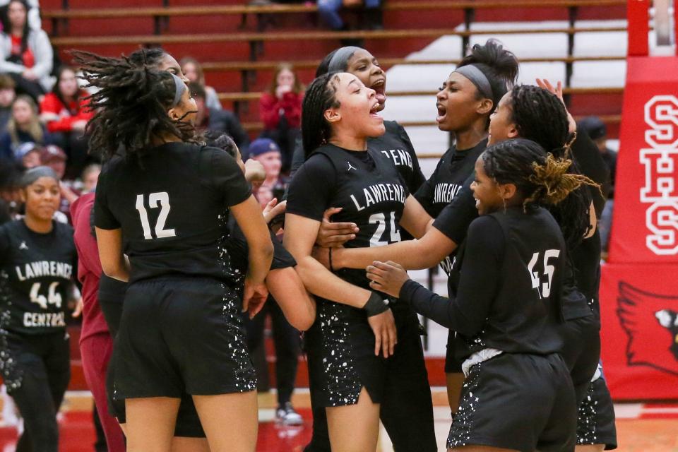 Lawrence Central celebrates their 53-40 victory as Lawrence Central takes on Center Grove High School in the Girls Class 4A IHSAA Southport Semi-state basketball championship, Feb 17, 2024; Indianapolis, IN, USA; at Southport High School