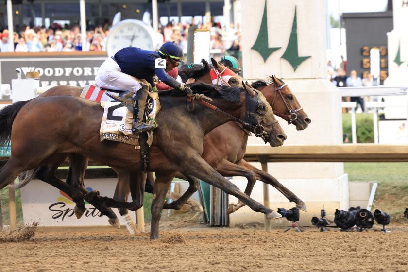 LOUISVILLE, KENTUCKY - MAY 04: Mystik Dan #3, ridden by jockey Brian J. Hernandez Jr.