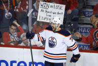 Edmonton Oilers defenseman Evan Bouchard celebrates his goal against the Calgary Flames during the second period of Game 2 of an NHL hockey Stanley Cup playoffs second-round series Friday, May 20, 2022, in Calgary, Alberta. (Jeff McIntosh/The Canadian Press via AP)