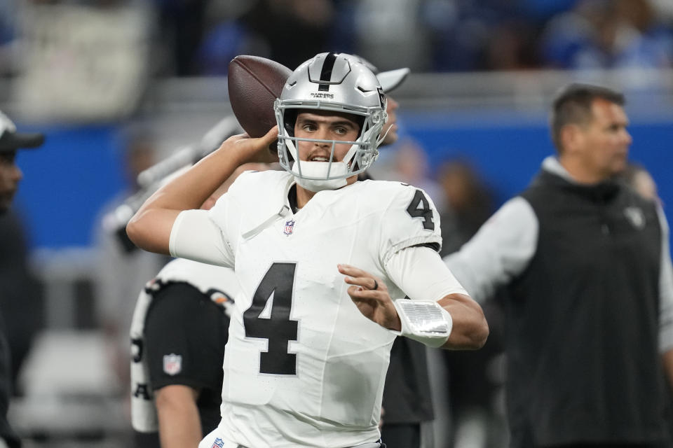 Las Vegas Raiders quarterback Aidan O'Connell throws during pregame of an NFL football game against the Detroit Lions, Monday, Oct. 30, 2023, in Detroit. (AP Photo/Paul Sancya)