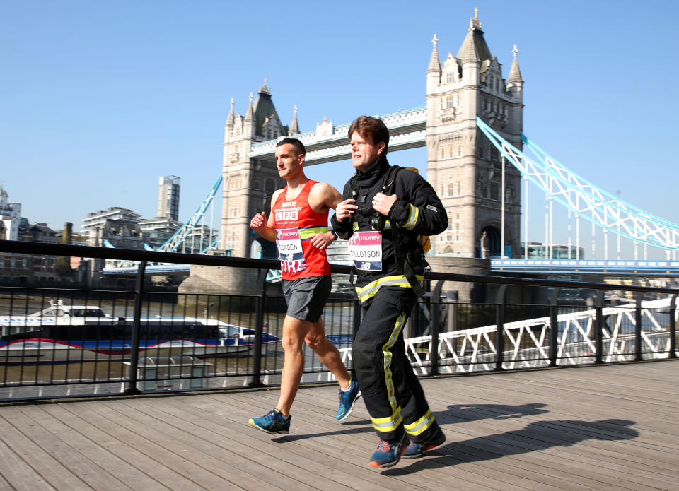 A firefighter who fought the Grenfell Tower blaze trains ahead of the London Marathon (PA)