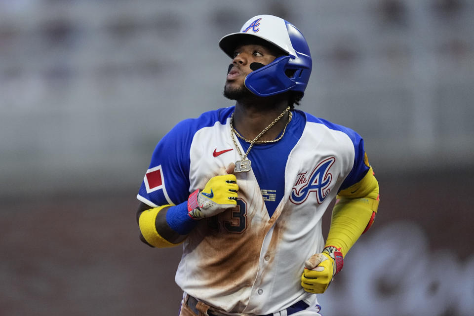 Atlanta Braves' Ronald Acuna Jr. runs the bases after hitting a two-run home run against the Milwaukee Brewers during the fourth inning of a baseball game Saturday, July 29, 2023, in Atlanta. (AP Photo/John Bazemore)