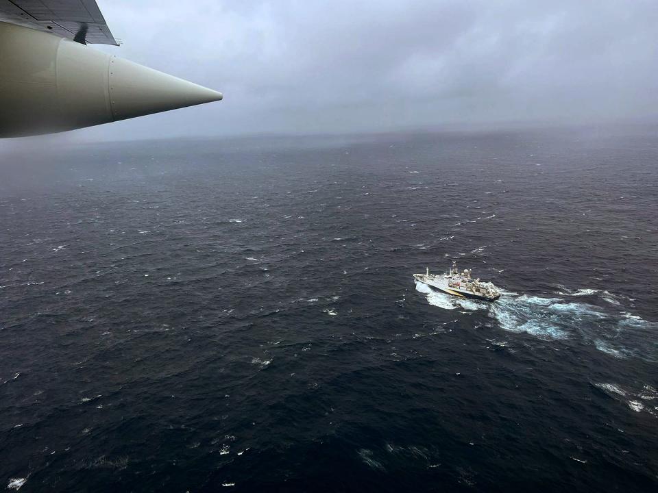 ATLANTIC OCEAN - JUNE 21: In this U.S. Coast Guard handout, a Coast Guard Air Station Elizabeth City, North Carolina HC-130 Hercules airplane flies over the French research vessel, L'Atalante approximately 900 miles East of Cape Cod during the search for the 21-foot submersible, Titan, June 21, 2023 over the Atlantic Ocean. The unified command is searching for five people after the Canadian research vessel Polar Prince lost contact with their submersible during a dive to the wreck of the Titanic on June 18, 2023.