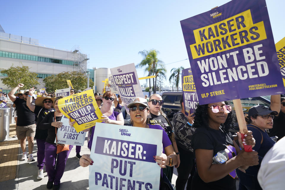 FILE - Kaiser Permanent workers picket Thursday, Oct. 5, 2023, in Baldwin Park, Calif. According to an annual report published Thursday, Feb. 15, 2024, from the Labor Action Tracker, a collaboration between researchers at Cornell University and the University of Illinois, those involved in work stoppages climbed 141% in 2023 — from 224,000 to 539,000 striking workers. (AP Photo/Ryan Sun, File)