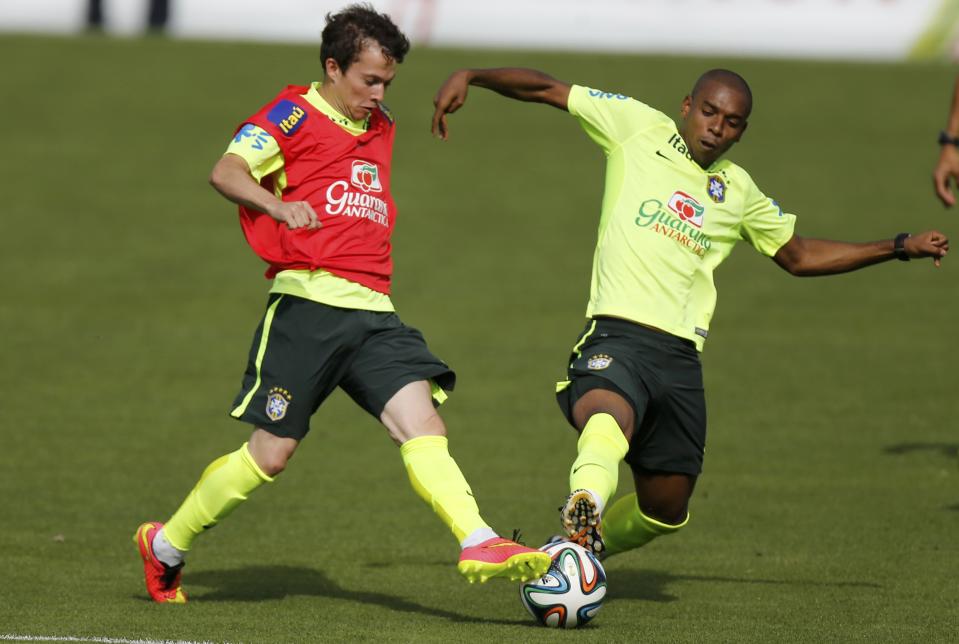 Brazil's Bernard and Fernadinho attend a training session in Teresopolis near Rio de Janeiro