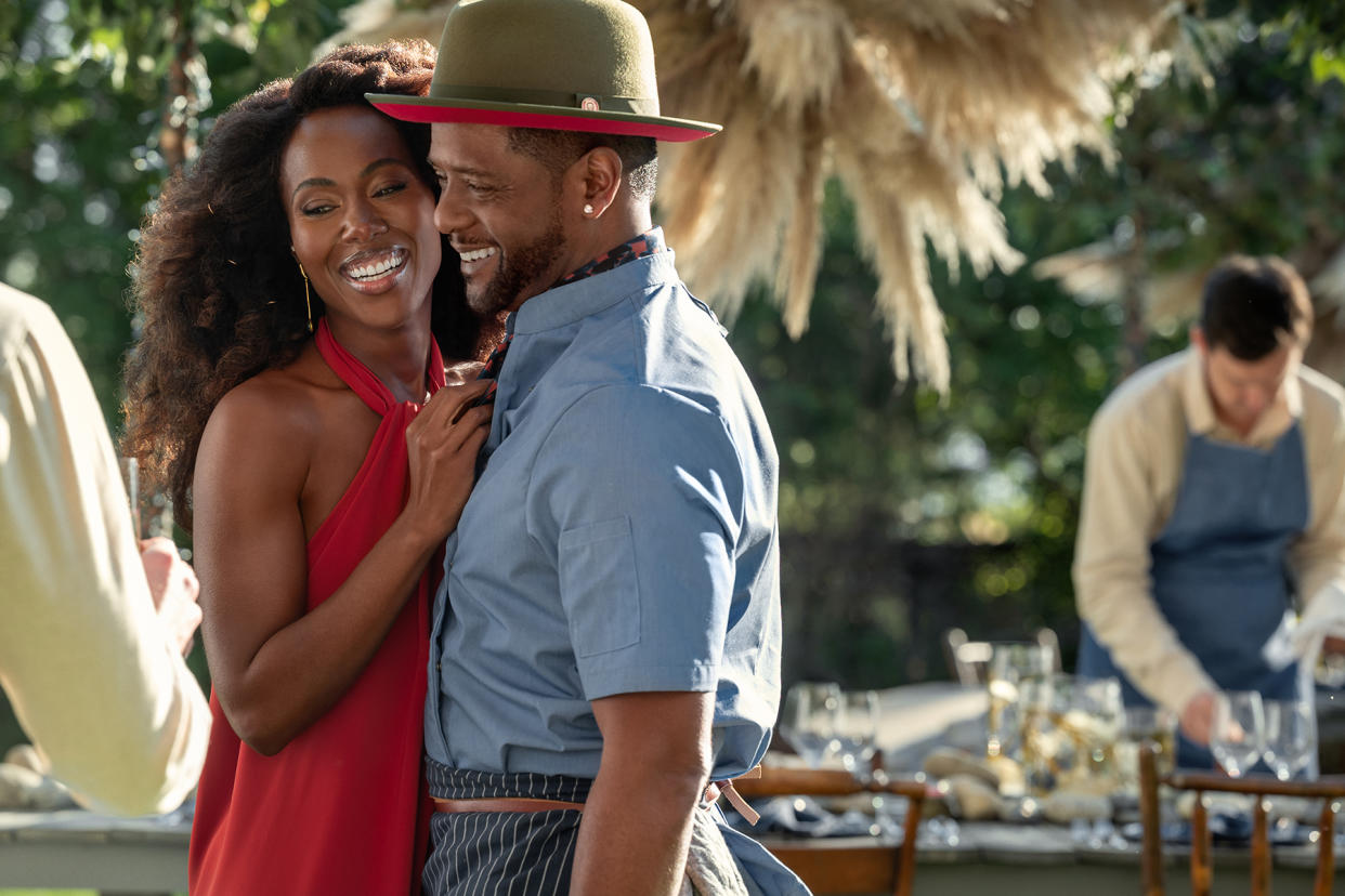 DeWanda Wise and Blair Underwood in a movie scene.