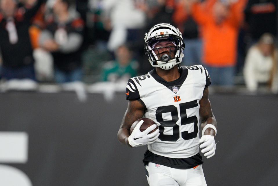 Tee Higgins runs for a touchdown against the Miami Dolphins.