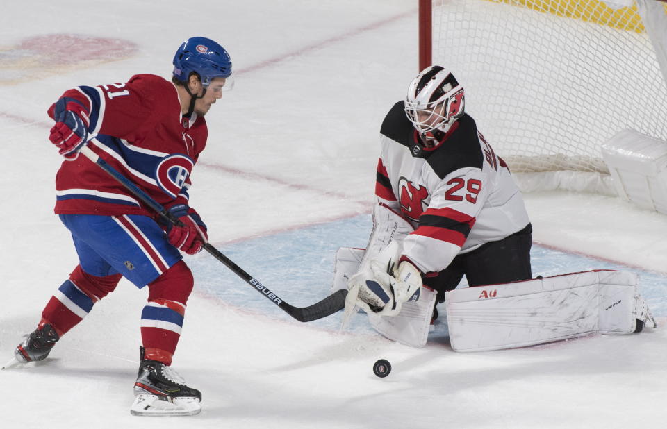 Montreal Canadiens' Nick Cousins moves in against New Jersey Devils goaltender Mackenzie Blackwood during second-period NHL hockey game action in Montreal, Thursday, Nov. 28, 2019. (Graham Hughes/The Canadian Press via AP)
