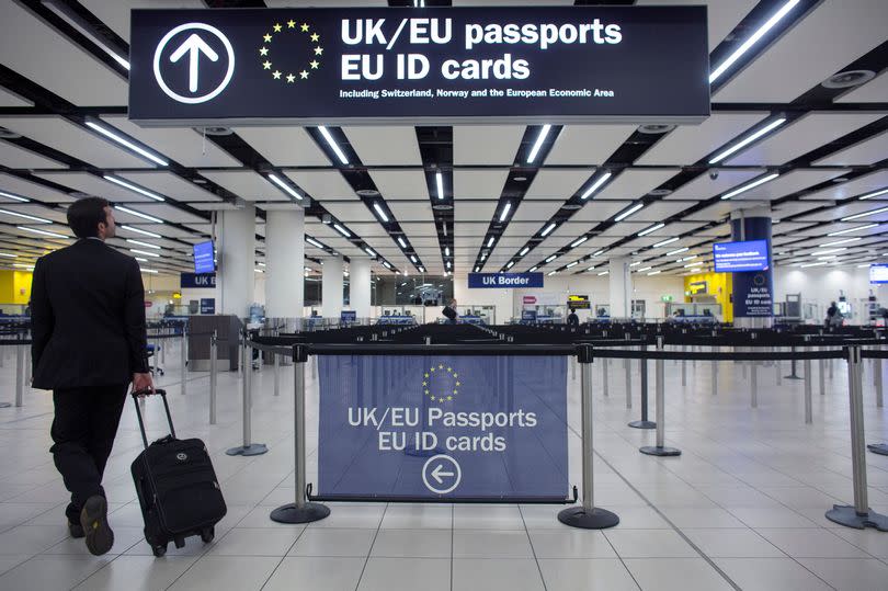 Photo shows border control in the airport