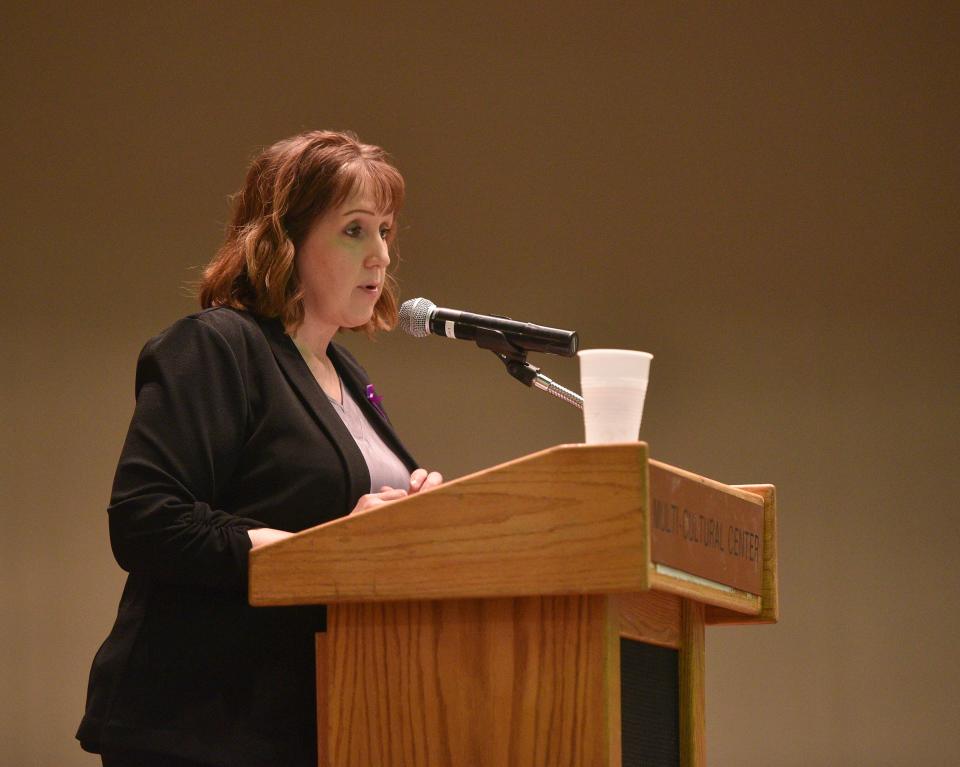 Amy Carter, part of the Children’s Inn, speaks during Take Back The Night at the Mult-Cultural Center in Sioux Falls on Thursday, Oct. 7, 2021.