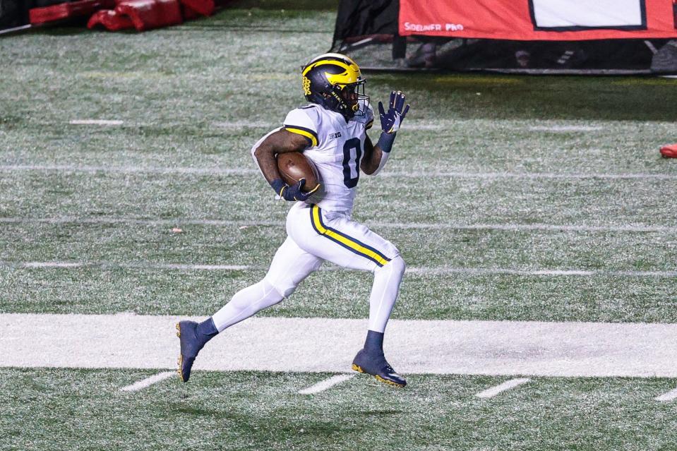 Michigan Wolverines wide receiver Giles Jackson (0) returns a kickoff for a touchdown during the third quarter against the Rutgers Scarlet Knights Nov. 22, 2020, at SHI Stadium.