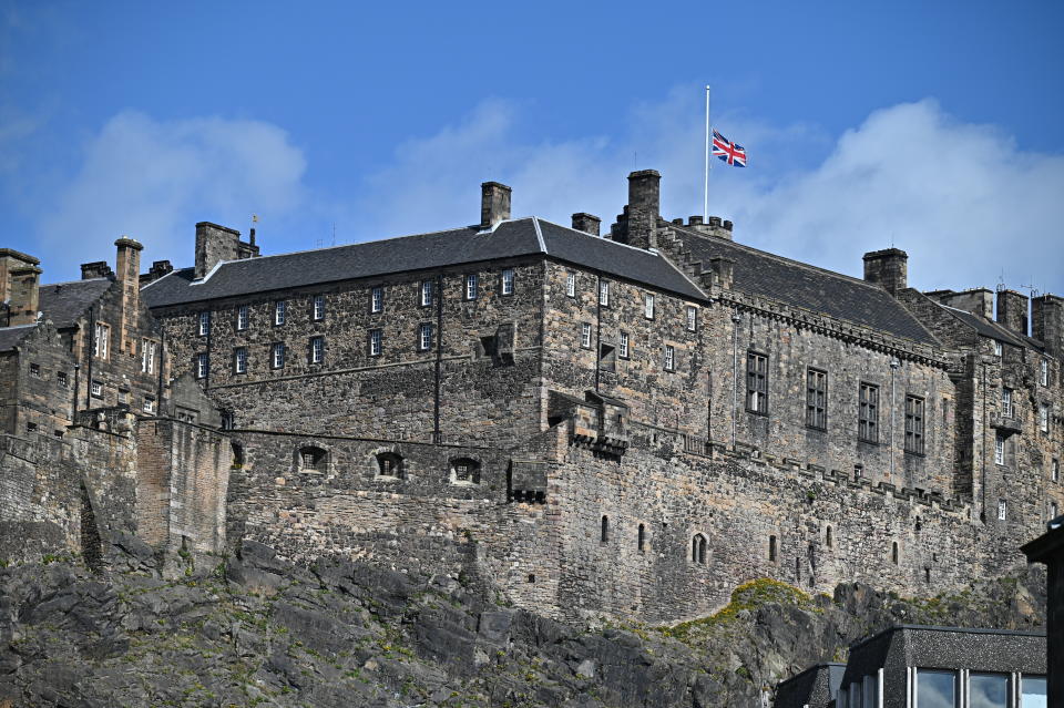 EDINBURGH, SCOTLAND - APRIL 09:  The Union flag flies at half mast to mark the death of the Duke Of Edinburgh at Edinburgh Castle on April 09, 2021 in Edinburgh, United Kingdom. The Queen has announced the death of her beloved husband, His Royal Highness Prince Philip, Duke of Edinburgh. HRH passed away peacefully this morning at Windsor Castle. (Photo by Jeff J Mitchell/Getty Images)