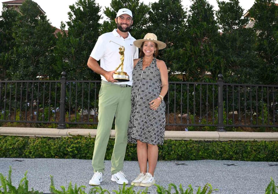 <p>Ben Jared/PGA TOUR via Getty</p> Scottie Scheffler and his wife Meredith Scheffler in March 2024