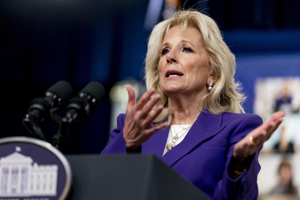 First lady Jill Biden speaks at a virtual event with military families from around the world as part of the White House initiative to support military and veteran families in the South Court Auditorium in the Eisenhower Executive Office Building on the White House Campus, Wednesday, April 7, 2021, in Washington. (AP Photo/Andrew Harnik)