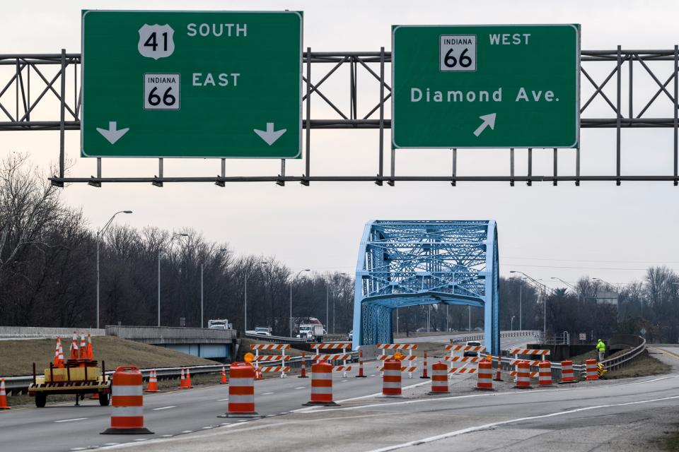 Southbound U.S. 41 traffic is diverted to the Diamond Avenue exit ramp while INDOT workers perform a damage assessment on the Pigeon Creek bridge in Evansville, Wednesday morning, Jan. 22, 2020. A truck hauling an oversized load caused structural damage to the bridge, closing it for nearly three years.