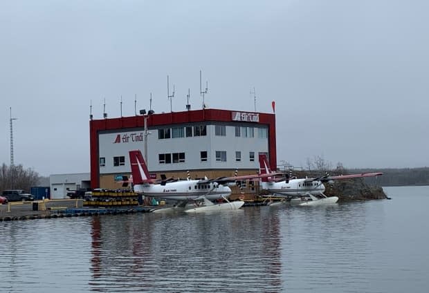 Air Tindi's base on Latham Island in Yellowknife. The airline's president, Chris Reynolds, said the federal government's announcement earlier this month that vaccinations would be required by all commercial air passengers felt 'a bit rushed.' (Sidney Cohen/CBC - image credit)