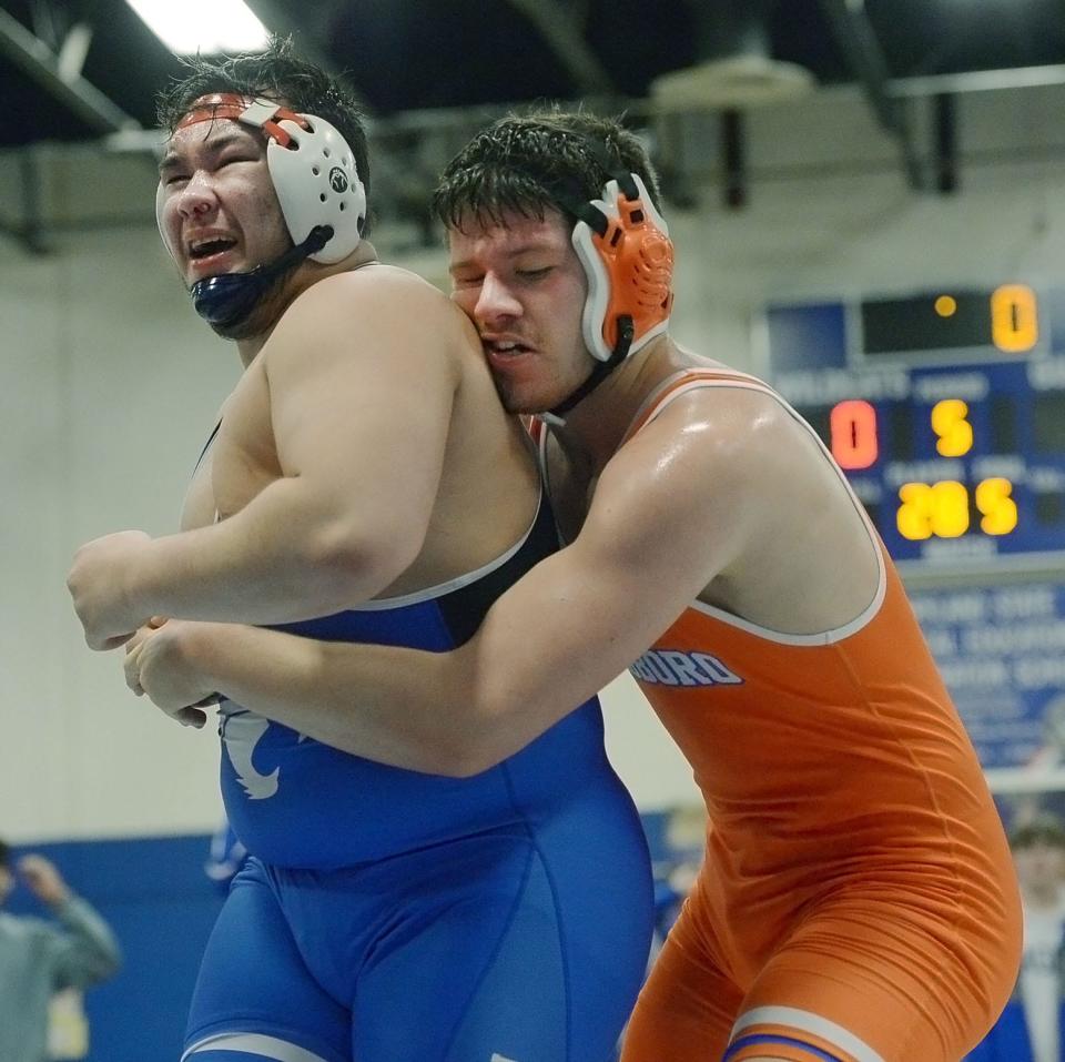 Williamsport's Mason Wolfensberger, left, tries to escape from Boonsboro's Sean Cornell during the 285-pound final. Cornell won by decision, 2-1, in double overtime.