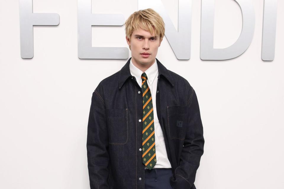 <p>Daniele Venturelli/Getty</p> Nicholas Galitzine debuts blonde hair at Fendi Men