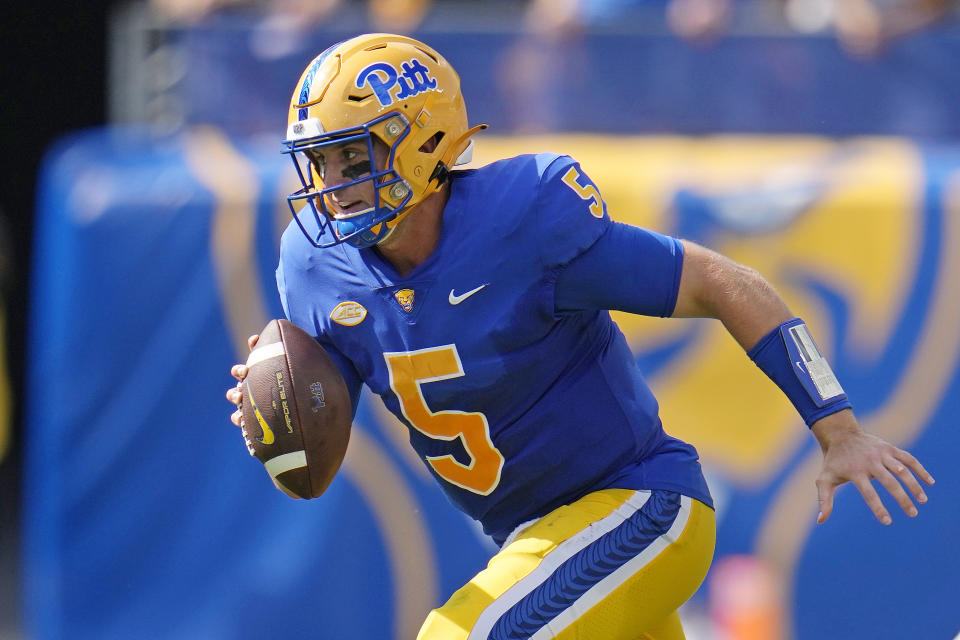 Pittsburgh quarterback Phil Jurkovec (5) scrambles out of the pocket looking to pass during the first half of an NCAA college football game against Wofford in Pittsburgh Saturday, Sept. 2, 2023. (AP Photo/Gene J. Puskar)