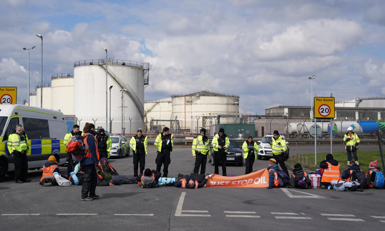 <span>Climate activists from Just Stop Oil staging a blockade at Kingsbury oil terminal in Warwickshire.</span><span>Photograph: Jacob King/PA</span>