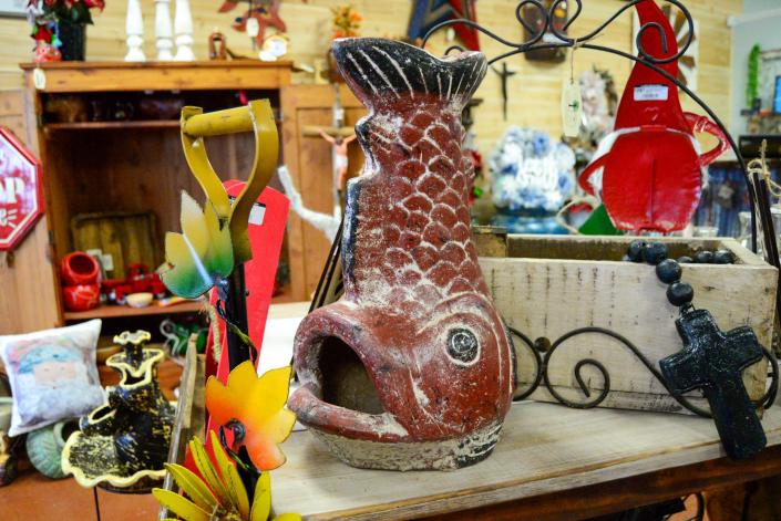 A mini coy fish chimenea available for purchase at La Belle Maison D&#xe9;cor in Houma.