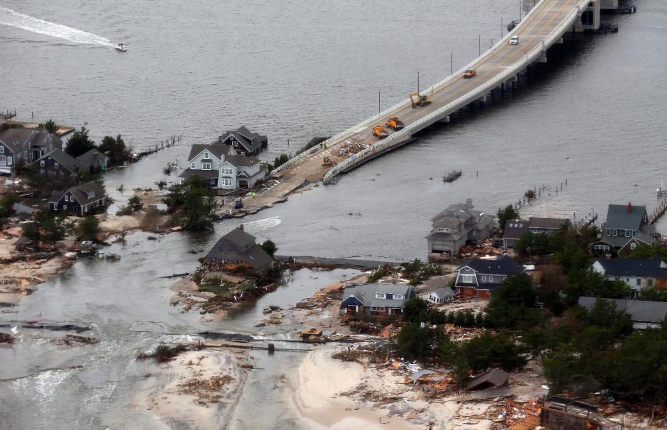 The view of storm damage over the Atlantic Coast in Seaside Heights, N.J., Wednesday, Oct. 31, 2012, from a helicopter traveling behind the helicopter carrying President Obama and New Jersey Gov. Chris Christie, as they viewed storm damage from superstorm Sandy. (AP Photo/Doug Mills, Pool)