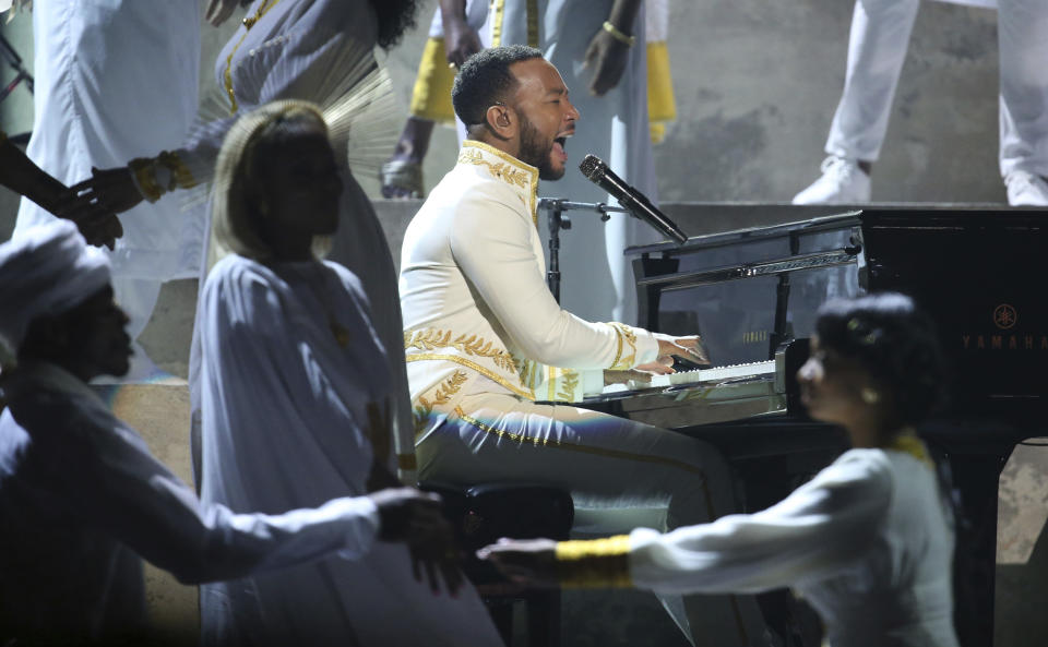 John Legend performs during a tribute in honor of the late Nipsey Hussle at the 62nd annual Grammy Awards on Sunday, Jan. 26, 2020, in Los Angeles. (Photo by Matt Sayles/Invision/AP)