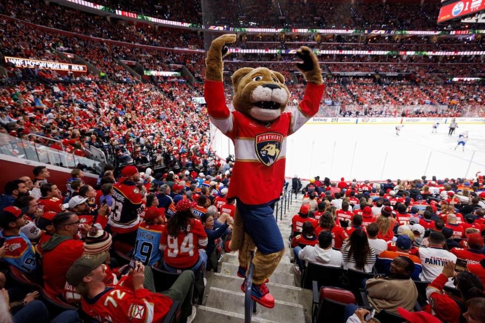 Stanley C Panthers rallies the fans during the first period of Game 7.