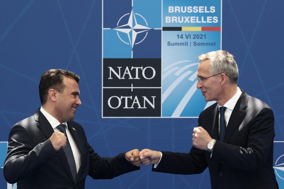 North Macedonia’s Prime Minister Zoran Zaev (L) is greeted by Nato Secretary General Jens Stoltenberg (R) during the Nato summit (POOL/AFP via Getty Images)