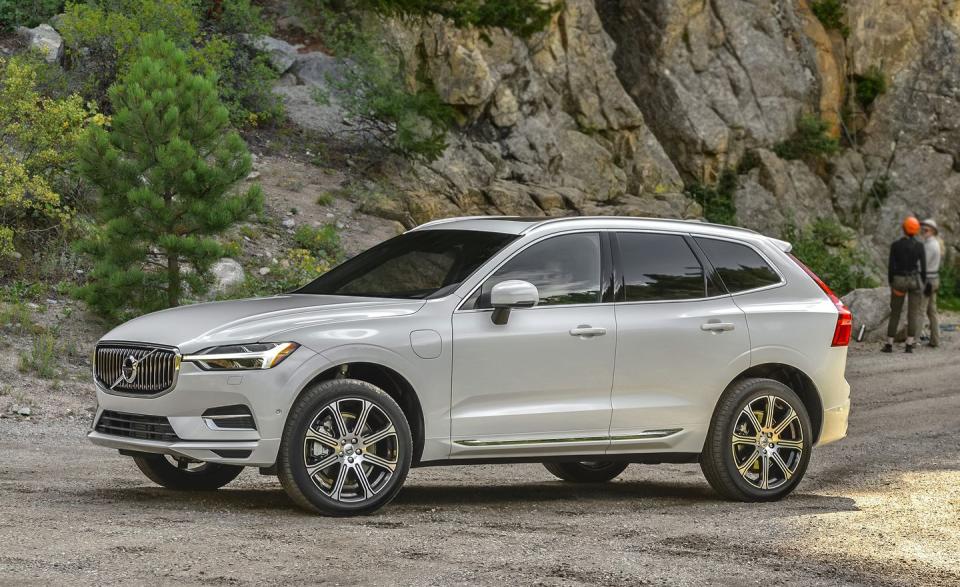 <p>Why does <a rel="nofollow noopener" href="https://www.caranddriver.com/reviews/2018-volvo-xc60-t8-eawd-plug-in-hybrid-test-review" target="_blank" data-ylk="slk:Volvo's plug-in hybrid XC60 crossover bristle;elm:context_link;itc:0;sec:content-canvas" class="link ">Volvo's plug-in hybrid XC60 crossover bristle</a> with 400 horsepower? Why not? Using the same turbo- and supercharged four-cylinder engine and duo of electric motors as the S60, S90, and XC90 listed elsewhere in this roundup, the XC60 T8 plug-in is sufficiently motivated to reach 60 mph in a quick 5.1 seconds. It also delivers an EPA-estimated 18 miles of electric-only operation, which is much less interesting (and way more useful to hybrid shoppers) than 400 horsepower. </p>