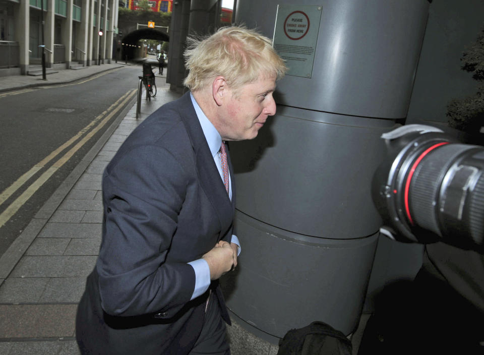 Conservative Party leadership contender Boris Johnson arrives for the Conservative National Convention meeting in central London, Saturday June 15, 2019. Britain's Conservative Party is holding a contest to replace Prime Minister Theresa May, and party legislators will continue to hold elimination votes until the final two contenders will be put to a vote of 160,000 Conservative Party members nationwide, with the winner due to become Conservative Party leader and prime minister late July. (Yui Mok/PA via AP)