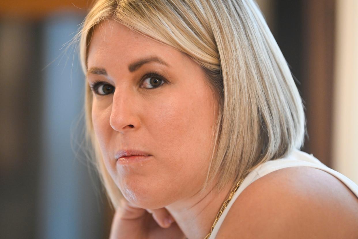 Chloe Akers pauses while preparing for a presentation, Friday, Aug. 5, 2022 in Nashville, Tenn. Her own sister survived a high-risk pregnancy with twin boys - because she had top-notch care, she believes. She thinks all of her neighbors deserve the same.