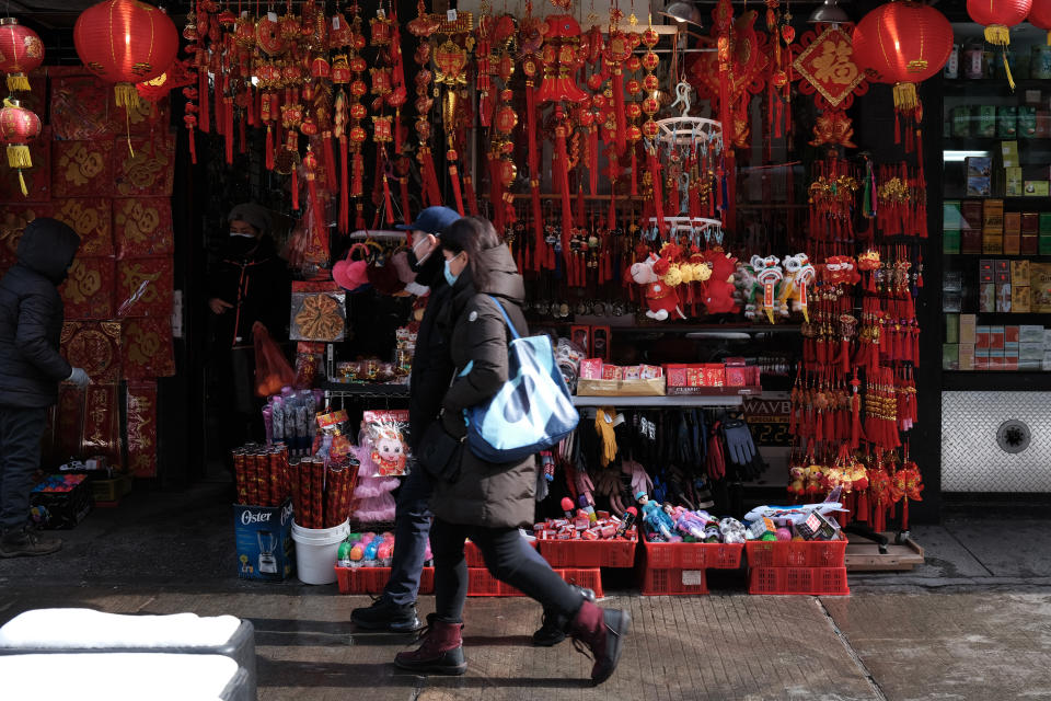 NEW YORK, NEW YORK - FEBRUARY 11: Lunar New Year decorations are displayed in Chinatown on the eve of the holiday on February 11, 2021 in New York City. Lunar New Year, also known as the Chinese New Year or Spring Festival, begins on Friday and will conclude the Year of the Rat and begin the Year of the Ox. While the annual Chinese celebration is usually a time for gatherings with family and friends, this year’s events will be limited due to the Covid-19 pandemic. (Photo by Spencer Platt/Getty Images)