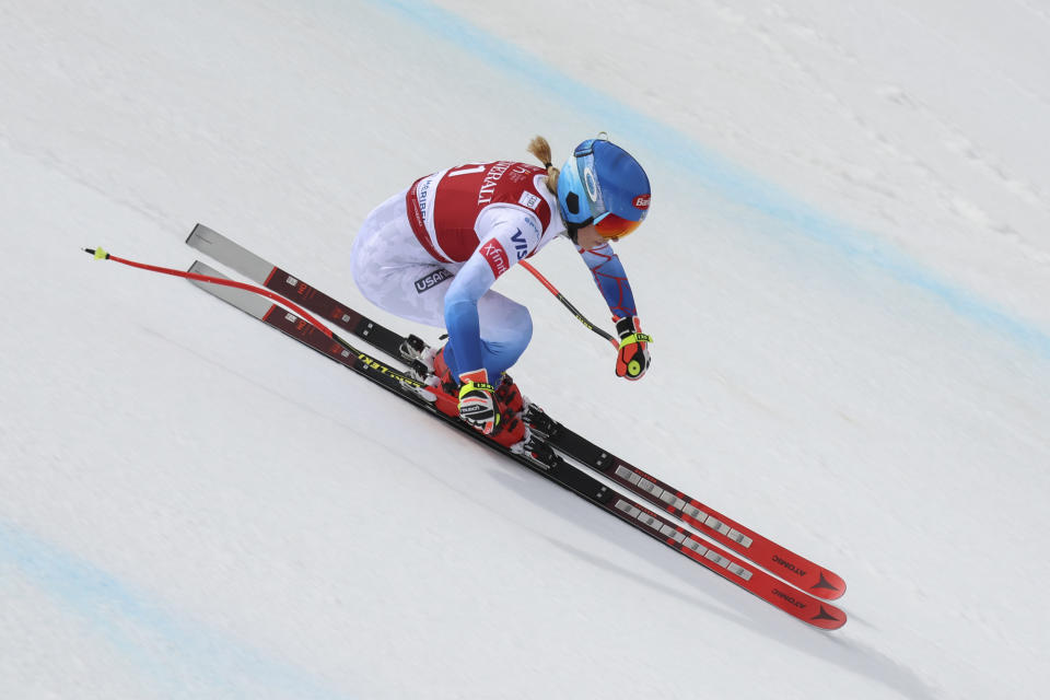 United States' Mikaela Shiffrin speeds down the course during an alpine ski, women's World Cup Finals downhill, in Courchevel, France, Wednesday, March 16, 2022. (AP Photo/Marco Trovati)