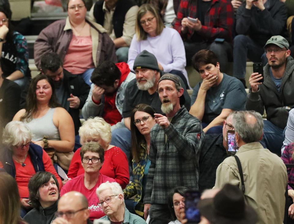 A area resident asks a water quality question during a meeting at East Palestine High School on Wednesday.