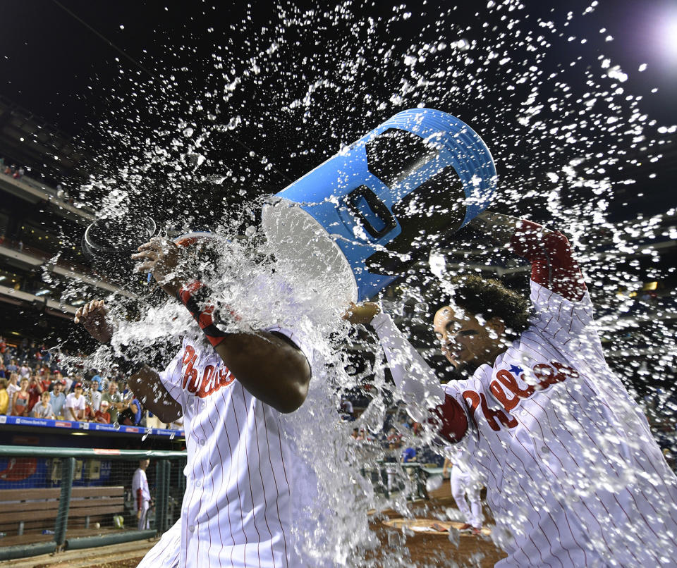 Maikel Franco is doused with water