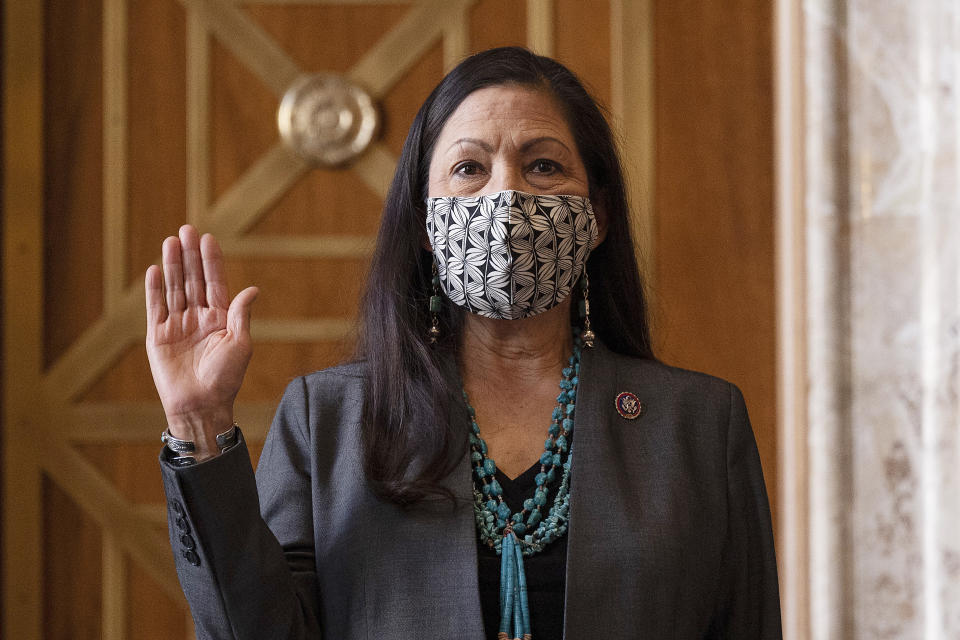 Rep. Deb Haaland, D-N.M., is sworn in before the Senate Committee on Energy and Natural Resources hearing on her nomination to be Interior Secretary, Tuesday, Feb. 23, 2021 on Capitol Hill in Washington. (Jim Watson/Pool via AP