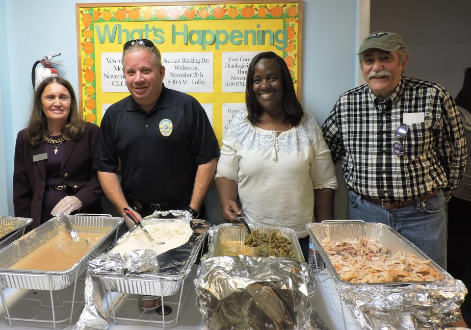 Ruth Pietruszewski, Martin County Tax Collector; Joseph Tumminelli, Stuart Police Chief; Thelma Washington, GWCCC executive director and Tom Campenni, GWCCC board member n 2019.