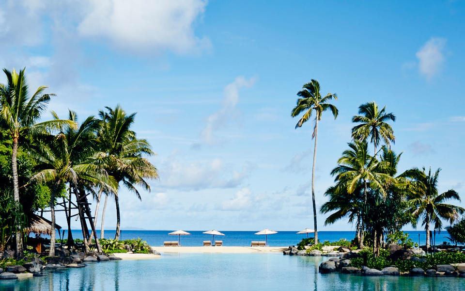 <p>If you’re going to stay on a private island to escape from the humdrum drudgery of your daily routine, you may as well pick the one that has hosted Oprah. Set on 3,500 acres of lush Fijian land, <a rel="nofollow noopener" href="http://www.travelandleisure.com/articles/a-reclusive-billionaires-private-island-resort-in-fiji" target="_blank" data-ylk="slk:Laucala;elm:context_link;itc:0;sec:content-canvas" class="link ">Laucala</a> is known for its over-the-top luxury and ultra-secluded digs. Each of the resort’s 25 villas, for example, has its own private pool. To visit Laucala, fly to Fiji and transfer to the hotel’s private plane for a 50-minute flight to Laucala. Work off any travel weariness by spending your days surrounded by coconut groves or diving into the turquoise waters and coral reefs that surround the island.</p>