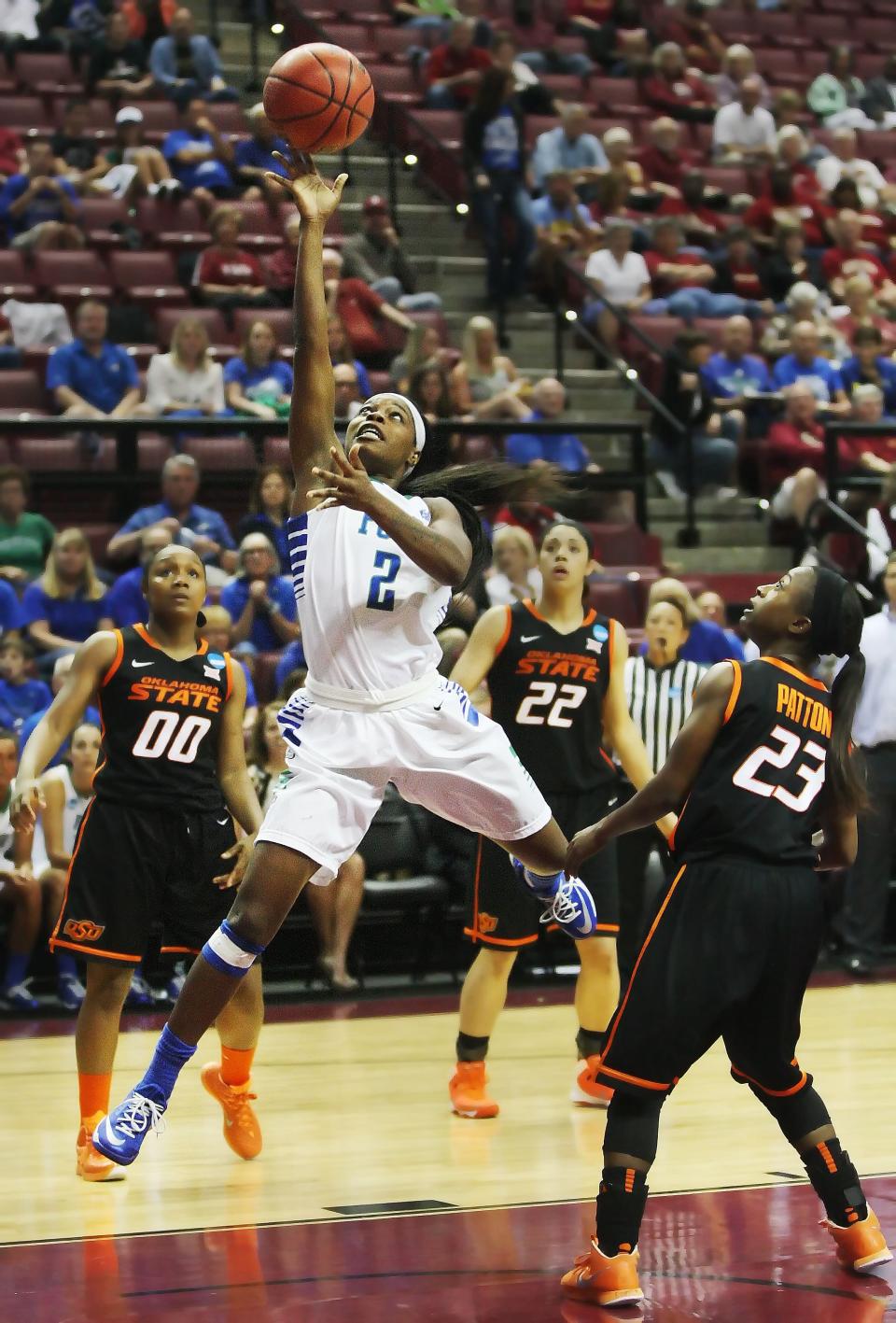 FGCU's Kaneisha Atwater scores against Oklahoma State University in an NCAA Women's Basketball Tournament first-round game in Tallahassee on March 21, 2015. Atwater scored 26 points as FGCU beat the Cowgirls 75-67.