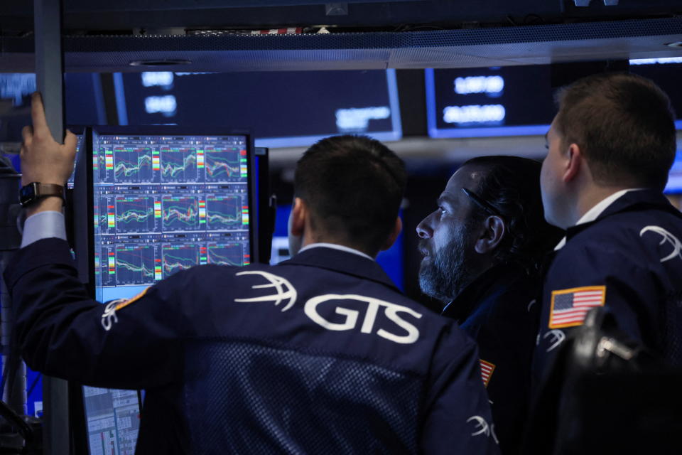 Traders work on the floor of the New York Stock Exchange (NYSE) in New York City, U.S., February 15, 2022. REUTERS/Brendan McDermid