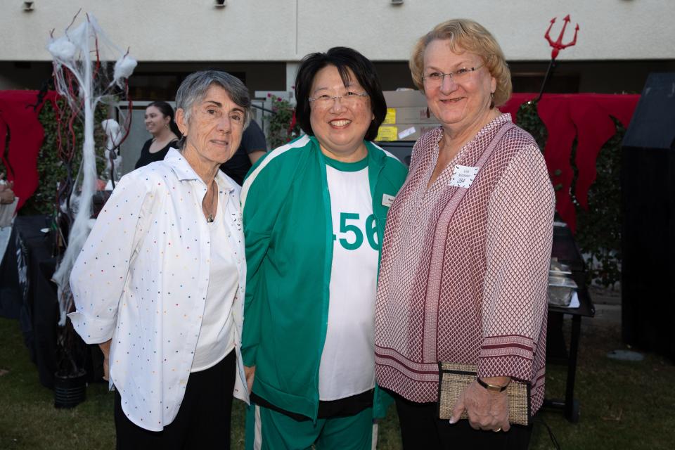 Boys & Girls Club of Palm Springs CEO and Executive Director Margaret Keung (center) poses with Cheryl O’Callaghan and Lisa Middleton at the Boys & Girls Club of Palm Springs' "Be a Hero for Kids Halloween Bash" on Oct. 1, 2022.